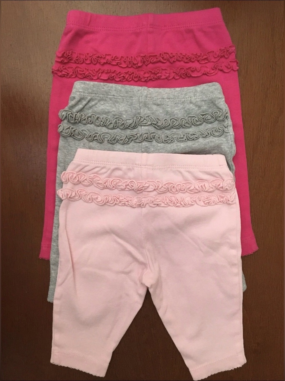 Carter’s Baby Girl Ruffle Pants. Two 3M Light Pink, Gray & One 6M Dark Pink